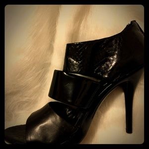 Carlos Santana open toe pumps